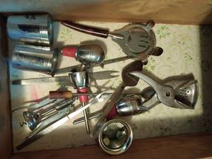 Two Drawers of Misc. Silverware, Utensils, and Barware