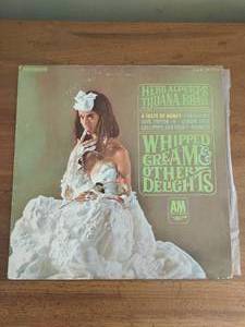 Herb Alberts Tijuana Brass 33 Record and Lionel Richie 45 Record
