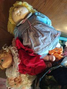 Collection Of Doll Clothes And Dolls