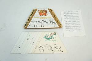 Lap harp and music sheets