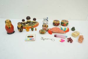 Nesting doll, wooden eggs, candles, jars and more