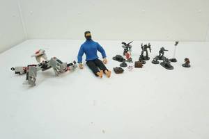 Action figure and game pawns