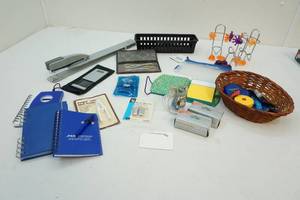 lot 90 image: Scissors, notepads, phone holders and more