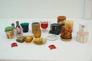 lot 18 image: Candles and candle holders