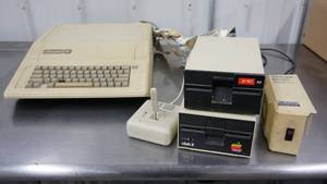 lot 29 image: Apple 11c Computer--Kensington Microwave System Saver--Apple Disk ll & Ics-y SCI-A2 & Controller