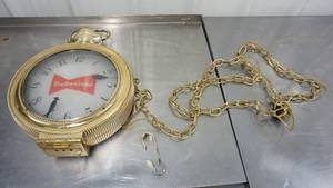 lot 49 image: Golden Budweiser Hanging (Watch) Clock