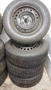 lot 60 image: Four Tires On Rims--Blizzak W560