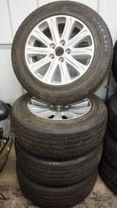 lot 61 image: Four Tires On Rims--Michelin--235-710-R460A