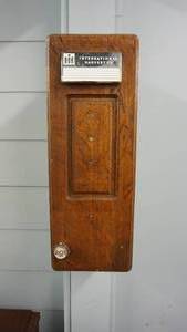 lot 2 image: International Harvester  RCA  Two Shelf Cabinet Made From Old Wall Telephone Box