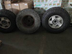 4 rims and tires 3 of the same rim ...