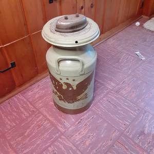 lot 100 image: Vintage light green Milk Can with o...