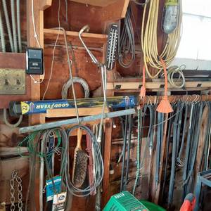 lot 198 image: Wall of bungee cords and straps, re...