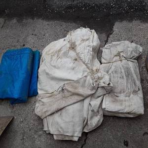 lot 127 image: (1) large blue tarp (exact length u...