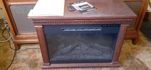 lot 202 image: Heat Surge Electric Fireplace Model...