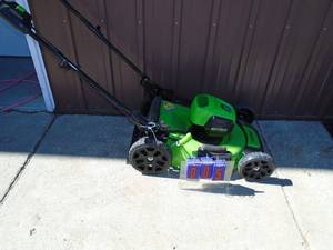 Greenworx 60 volt brushless lawn mower. Like new. No battery or charger. As shown.