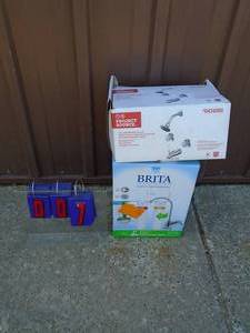 Brita water filtration system & replacement shower valve & head. As shown.