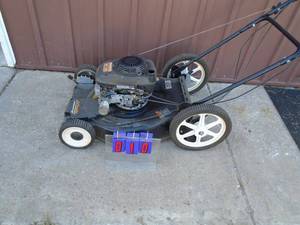Poulon pro lawn mower. Honda engine. Fires on ether & needs a little tlc. As shown.