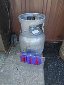 Small aluminum propane forklift tank. Used condition. As shown.