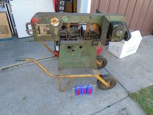 Tester horizontal band saw. Smaller unit with approx 12 throat. New motor. Tested & works. As shown.