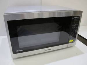 lot 706 image: Panasonic 1.3CuFt Stainless Steel Countertop Microwave Oven NN-SC668S 885170364462