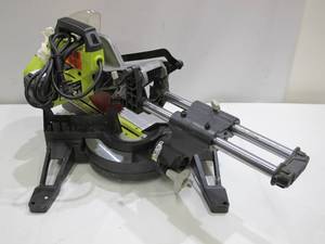 lot 823 image: Ryobi TSS102L 15 Amp 10 in. Sliding Compound Miter Saw with LED