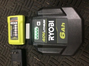lot 25 image: RYOBI 40V Lithium-Ion 6.0 Ah High Capacity Battery and Charger Kit
