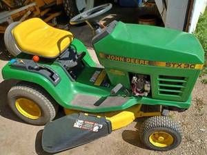 lot 4 image: John Deere STX30 Lawn Tractor with 9 hp. Kohler OHV Engine Serial M00STXA017828 - Super Clean