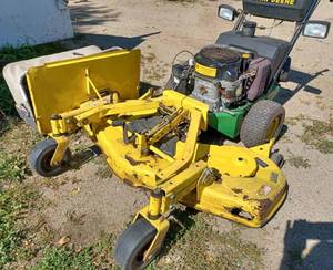 lot 6 image: John Deere 17 hp. Commercial Mower with Home Made 2-Wheel Card to Ride while operating