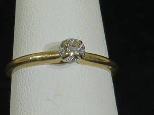 lot 6 image: 14 Karat Yellow Gold Ladies Diamond Solitaire Ring - .05 Carat