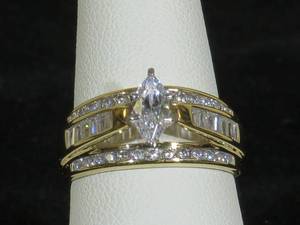 lot 3 image: 10 Karat Yellow Gold Ladies Simulated Diamond Ring - Unworn