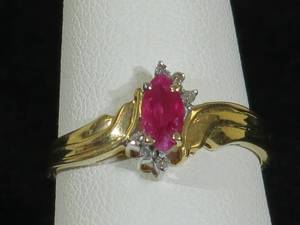 lot 9 image: 14 Karat Yellow Gold Ladies Ruby and Diamond Ring