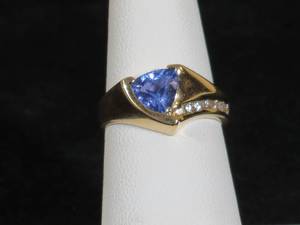 lot 11 image: 14 Karat Yellow Gold Ladies Tanzanite and Diamond Ring