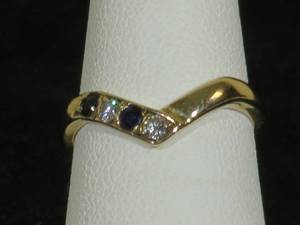 lot 14 image: 14 Karat Yellow Gold Ladies Sapphire and Diamond Band