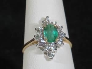 lot 21 image: 14 Karat Yellow Gold Ladies Emerald and Cubic Zirconia Ring