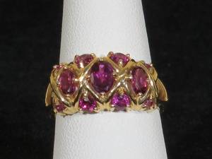 lot 23 image: 14 Karat Yellow Gold Ladies Grape Garnet Cocktail Ring