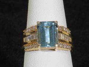 lot 27 image: 14 Karat Yellow Gold Ladies Aquamarine and Diamond Ring