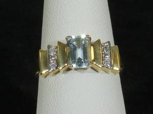 lot 28 image: 14 Karat Yellow Gold Ladies Aquamarine and Diamond Art Deco Style Ring