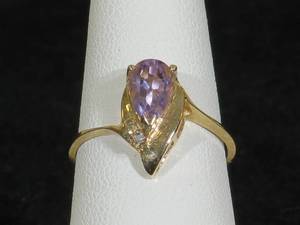 lot 30 image: 10 Karat Yellow Gold Ladies Amethyst and Diamond Ring
