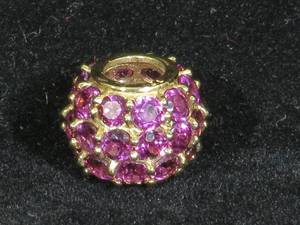 lot 42 image: Gold Tone Pandora Style Charm - Purple Stones