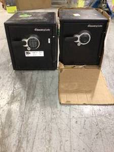 Lot of 2 Combination and  Lock Safes one safe does not have key Customer Returns See Pictures