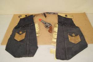 lot 163 image: Antique Toy Cowboy Chaps and Vintage Cap Gun
