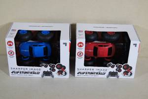 lot 140 image: 2 Unused Sharper Image Flip Stunt Rally Remote Control Cars