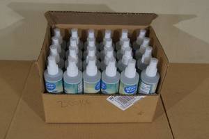 lot 195 image: Box of Miracle Brands Liquid Hand Sanitizing Spray