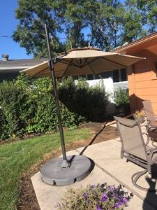 lot 83 image: Large Retractable Patio Umbrella