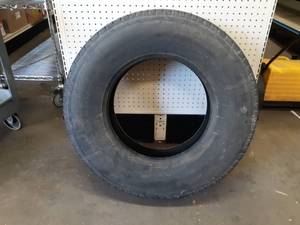 lot 28 image: Firestone Transforce HT Truck Tire 9.50R16.5LT - USED, Good Tread - NO SHIPPING