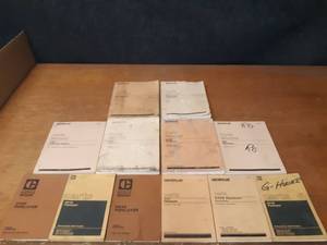lot 34 image: Lot of (12) CATERPILLAR Parts Manuals - D353 Engine, 572F, 561D, 572G, 572F, 594H, 583 and 594 Pipelayer - SHIPPING AVAILABLE