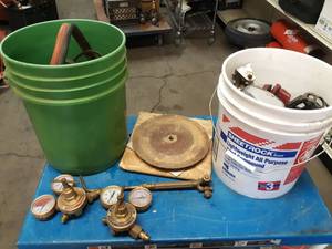 lot 210 image: Brazing Torch w Oxygen and Acetylene Gauges and Hose, Lot of Saw Blades and Buckets of Bicycle Parts - NO SHIPPING
