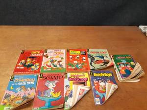lot 656 image: Lot of (16) Walt Disney Comic Books - 12 to 40  - SHIPPING AVAILABLE