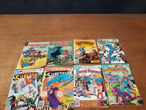 lot 664 image: Lot of (8) Superman, Super Friends, Superboy, Raggedy Ann and Andy Comic Books - 12 to 50  - SHIPPING AVAILABLE