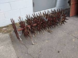 lot 7 image: Section with (9) Rotary Hoes - Overall Measures about 49 Long and 19 Diameter - NO SHIPPING